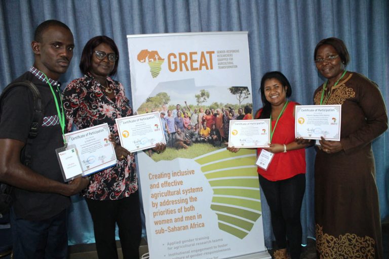 four participants display certificates